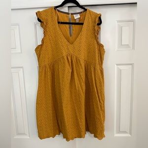 Mustard dress. Flutter sleeve. Eyelet detail